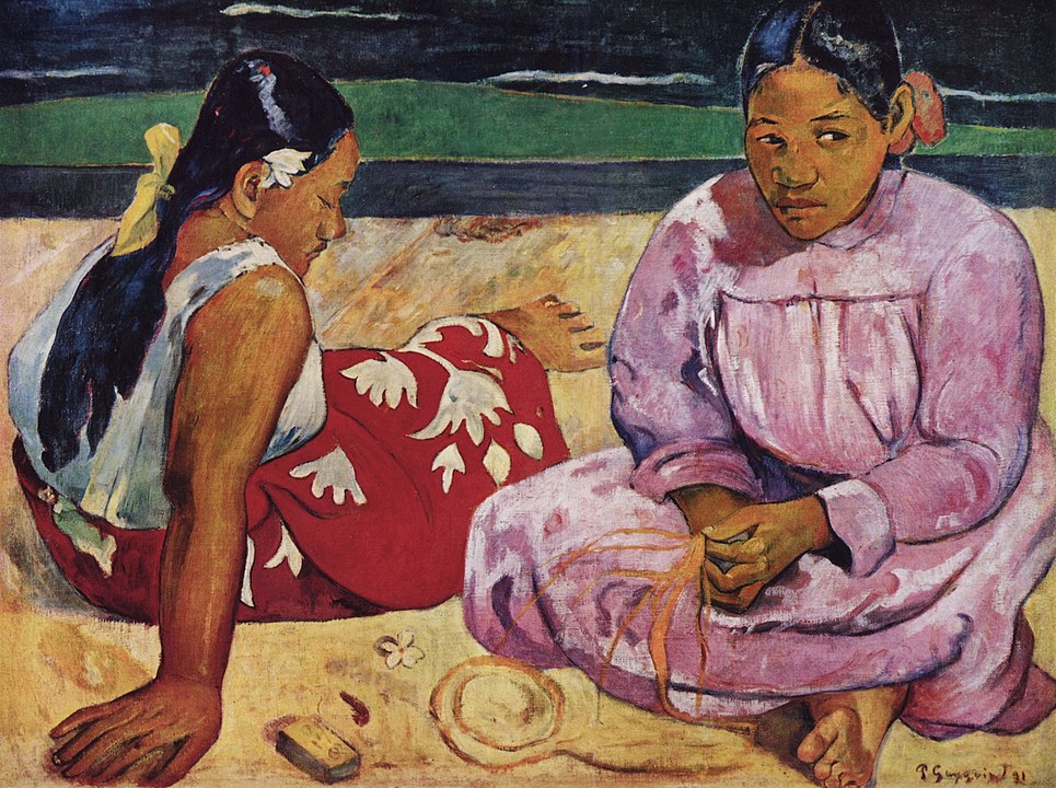 Tahitian women on a beach